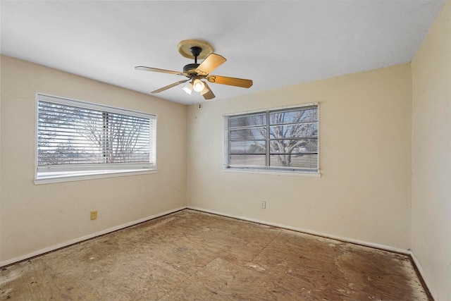 empty room featuring ceiling fan