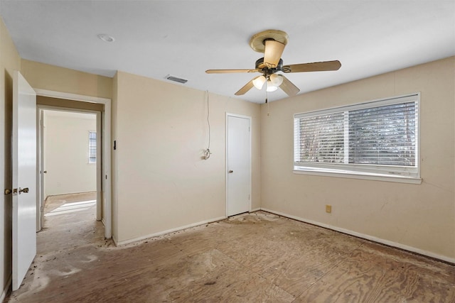 unfurnished bedroom featuring visible vents and ceiling fan