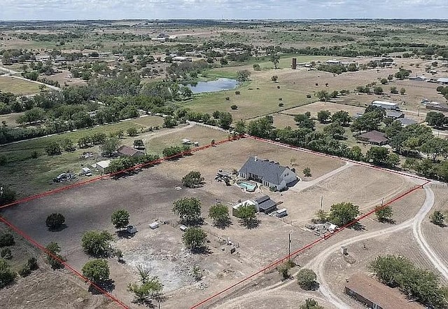 bird's eye view with a rural view and a water view