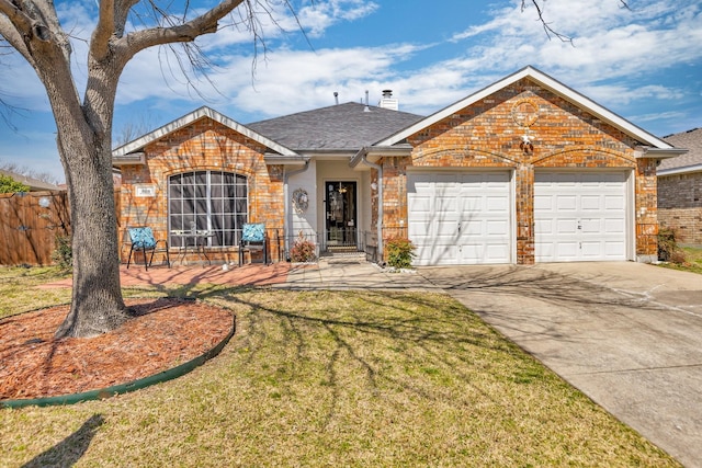 ranch-style home featuring a front yard, fence, concrete driveway, a garage, and brick siding