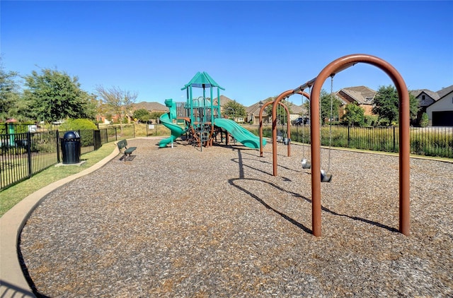 communal playground featuring fence