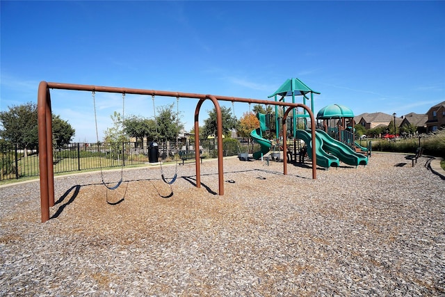 community playground featuring fence