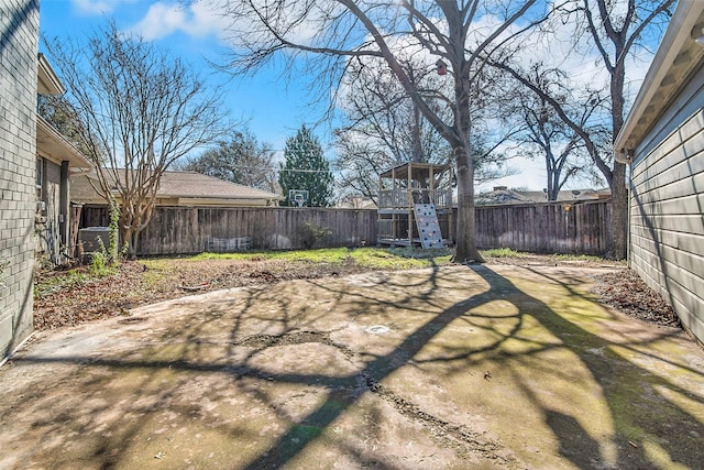 view of yard featuring a patio area and a fenced backyard