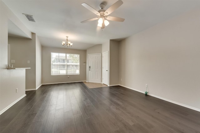 unfurnished living room with visible vents, baseboards, dark wood-style flooring, and ceiling fan with notable chandelier