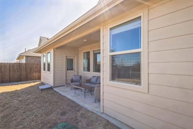 view of patio featuring fence