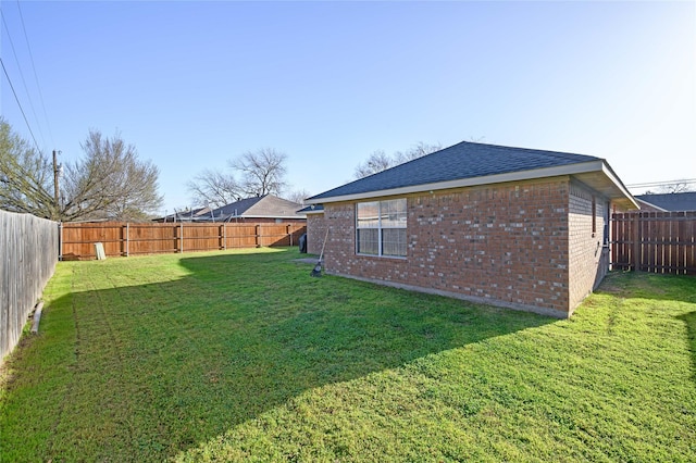 view of yard featuring a fenced backyard