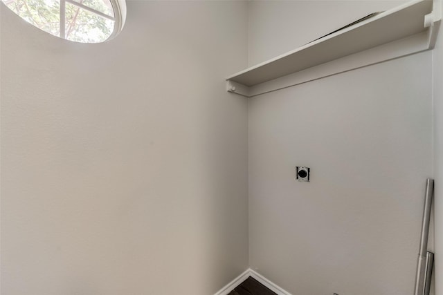 washroom featuring laundry area, baseboards, and electric dryer hookup