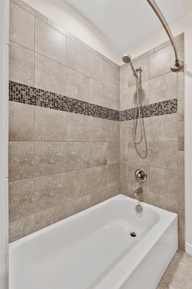 bathroom with shower / bathing tub combination