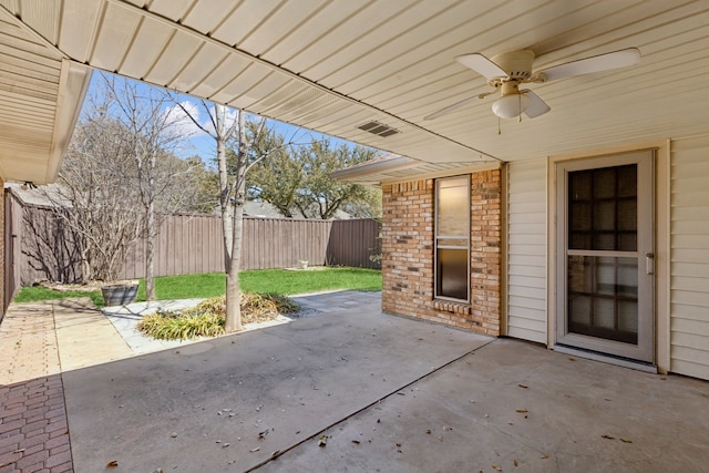 view of patio / terrace featuring a fenced backyard and a ceiling fan