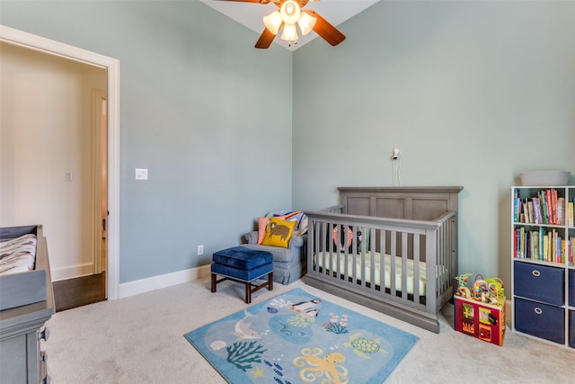 carpeted bedroom with baseboards and ceiling fan