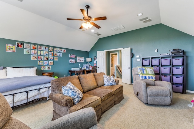 carpeted bedroom with vaulted ceiling, a ceiling fan, and visible vents