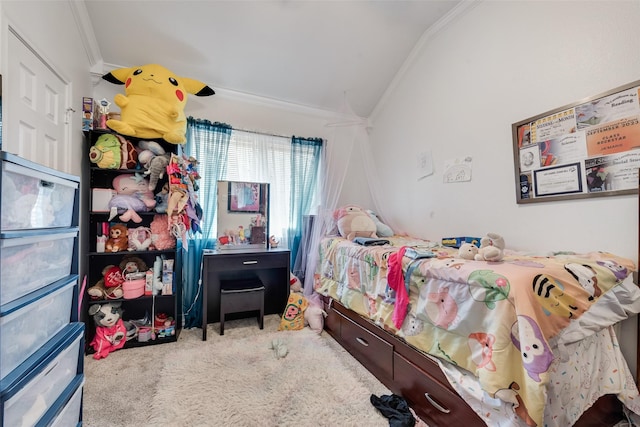 bedroom with vaulted ceiling, crown molding, and carpet floors