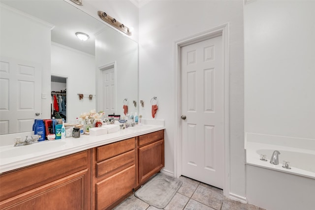 full bath with double vanity, ornamental molding, tile patterned floors, and a sink