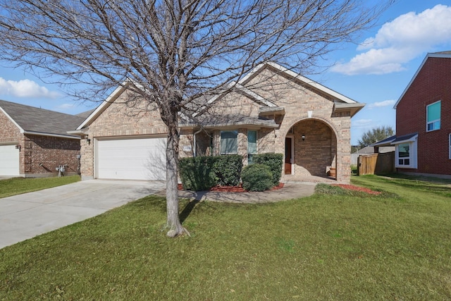 view of front facade featuring a front yard, an attached garage, brick siding, and driveway