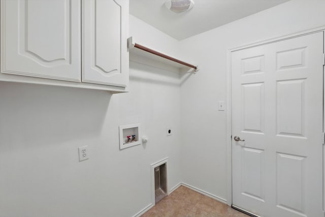 laundry room with electric dryer hookup, washer hookup, cabinet space, baseboards, and gas dryer hookup