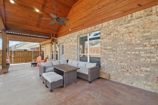 view of patio with a ceiling fan, outdoor lounge area, and fence