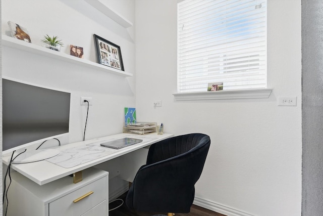 home office featuring baseboards