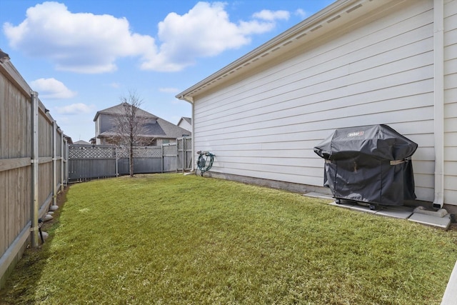 view of yard featuring a fenced backyard