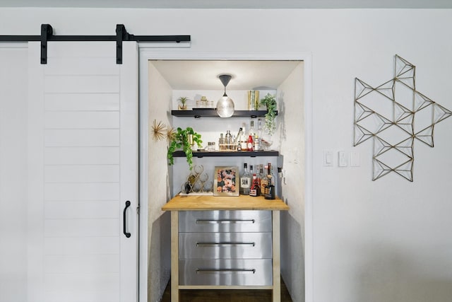 bar with a dry bar and a barn door