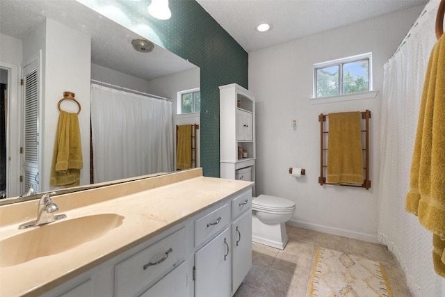 full bathroom with wallpapered walls, baseboards, toilet, tile patterned floors, and vanity