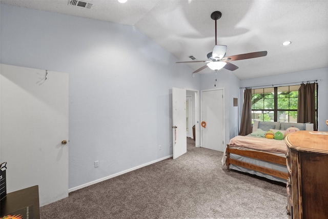 carpeted bedroom with visible vents, ceiling fan, baseboards, and lofted ceiling