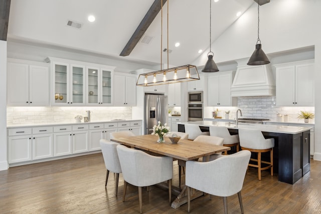 dining space with visible vents, high vaulted ceiling, beamed ceiling, and dark wood-style flooring