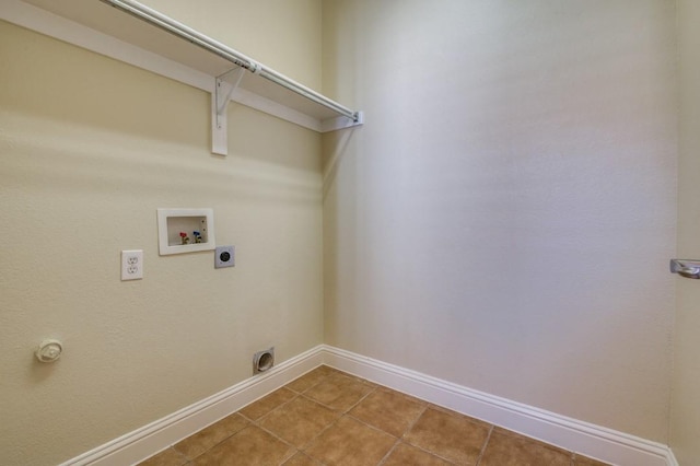 laundry area featuring tile patterned floors, washer hookup, baseboards, hookup for an electric dryer, and laundry area