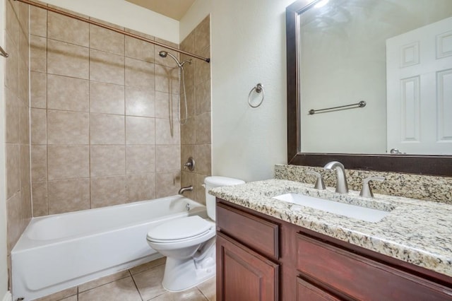 bathroom with tile patterned floors, tub / shower combination, toilet, and vanity