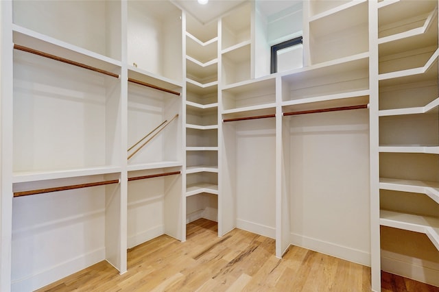 2031 Meadowlark Ct, Aledo, TX 76008 - walk in closet with wood finished floors