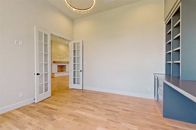 2031 Meadowlark Ct, Aledo, TX 76008 - spare room with french doors and light wood-style flooring