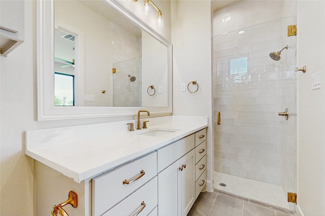 2031 Meadowlark Ct, Aledo, TX 76008 - bathroom with vanity, a shower stall, a ceiling fan, and tile patterned floors