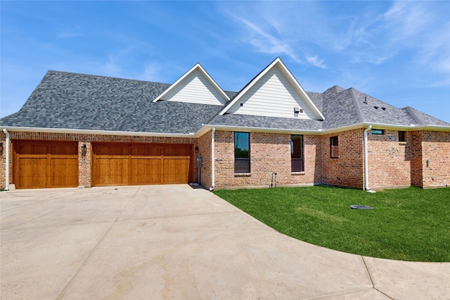 2031 Meadowlark Ct, Aledo, TX 76008 - view of front facade with an attached garage, brick siding, a front lawn, concrete driveway, and a shingled roof