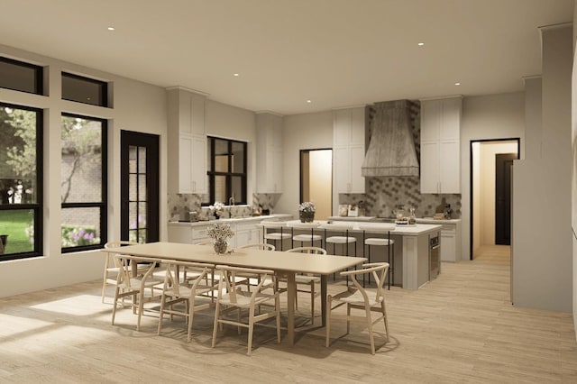 dining room featuring recessed lighting and light wood-style floors