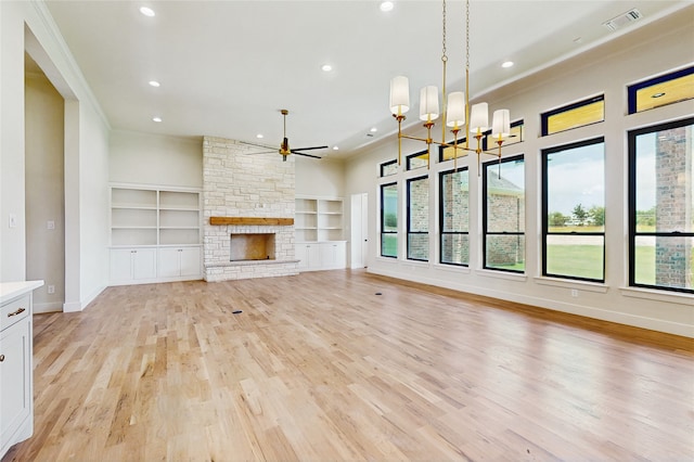 2031 Meadowlark Ct, Aledo, TX 76008 - unfurnished living room featuring ceiling fan, healthy amount of natural light, crown molding, recessed lighting, and built in features
