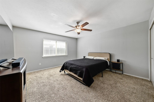 4925 Wheeler Dr, The Colony, TX 75056 - bedroom featuring baseboards, carpet flooring, and a ceiling fan
