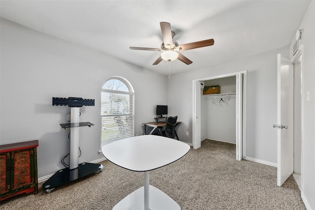 office featuring baseboards, carpet floors, and ceiling fan