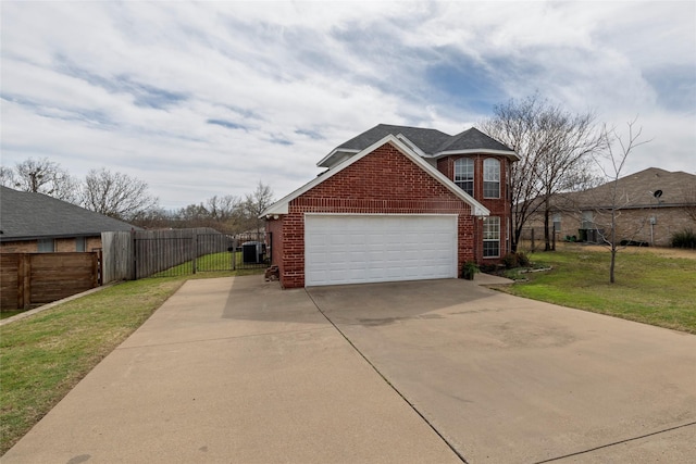 view of side of home featuring a lawn, fence, concrete driveway, a garage, and brick siding