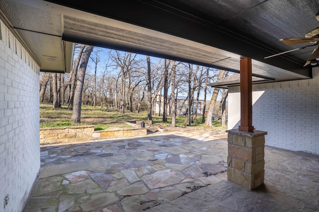 view of patio with ceiling fan