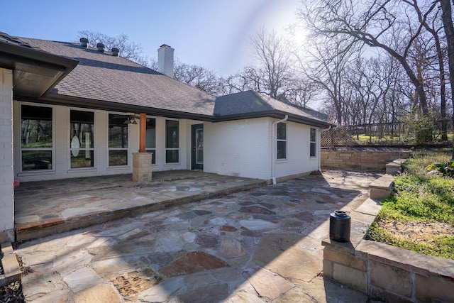 view of patio / terrace featuring fence