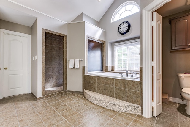 bathroom with tile patterned floors, toilet, vaulted ceiling, tiled shower, and a bath