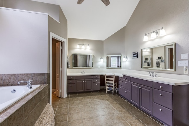 full bathroom featuring tile patterned flooring, vanity, a garden tub, high vaulted ceiling, and a ceiling fan