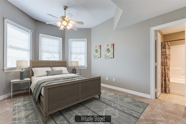 bedroom with carpet flooring, multiple windows, baseboards, and ceiling fan