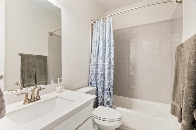 full bathroom with vanity, toilet, and shower / tub combo