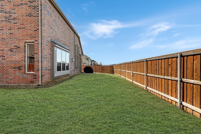 view of yard featuring a fenced backyard