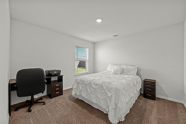 bedroom with carpet flooring, baseboards, and visible vents