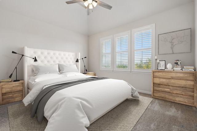 bedroom with lofted ceiling, carpet, baseboards, and ceiling fan