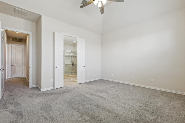 unfurnished bedroom with visible vents, baseboards, connected bathroom, and carpet flooring