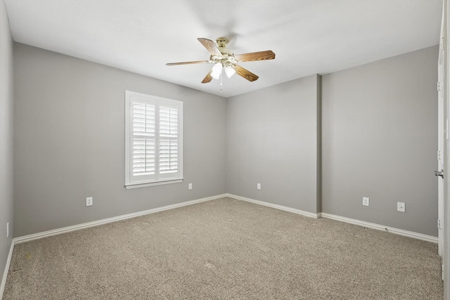 unfurnished room featuring a ceiling fan, baseboards, and carpet floors