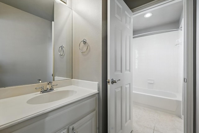 bathroom with vanity, tile patterned floors, and bathtub / shower combination