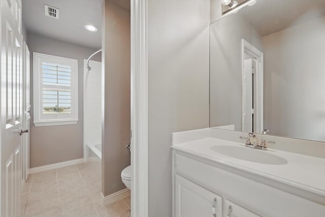 bathroom featuring tile patterned floors, visible vents, toilet, baseboards, and vanity